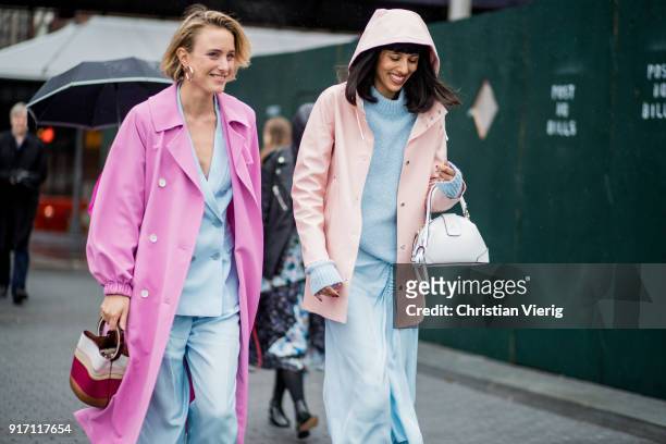 Rebecca Laurey wearing pink coat, blue suit and Babba Canales Rivera seen outside Tibi on February 11, 2018 in New York City.