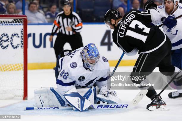 Tampa Bay Lightning goaltender Andrei Vasilevskiy makes a save on a shot from Los Angeles Kings left wing Kyle Clifford during the NHL game between...