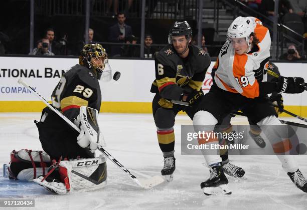 Marc-Andre Fleury of the Vegas Golden Knights blocks a Philadelphia Flyers shot as Colin Miller of the Golden Knights and Nolan Patrick of the...