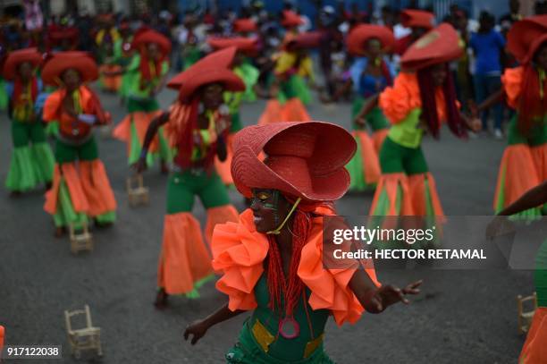 Dancers perform on the first day of the 2018 National Carnival Parade on February 11 in Port-au-Prince. The name of the carnival for this year in...