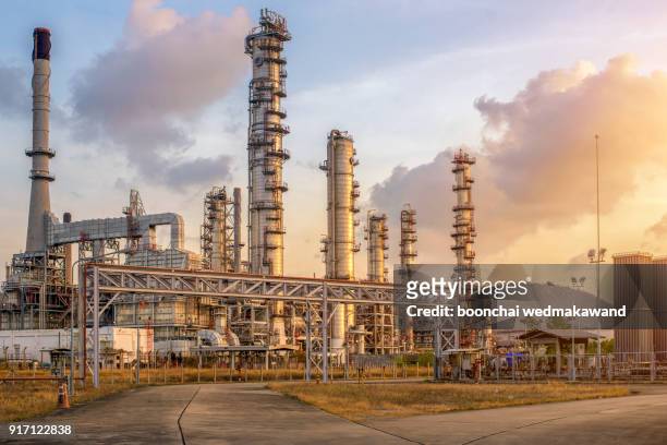 oil and gas refinery industry factory at sunset - refinery stock pictures, royalty-free photos & images