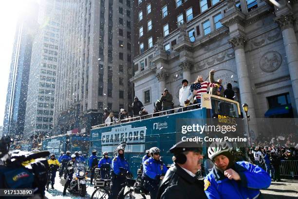 Destiny Vaeao Beau Allen and Chris Long of the Philadelphia Eagles celebrate atop a bus during festivities on February 8, 2018 in Philadelphia,...