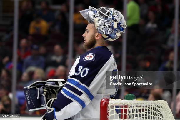 Manitoba Moose goalie Jamie Phillips in goal during the second period of the American Hockey League game between the Manitoba Moose and Cleveland...