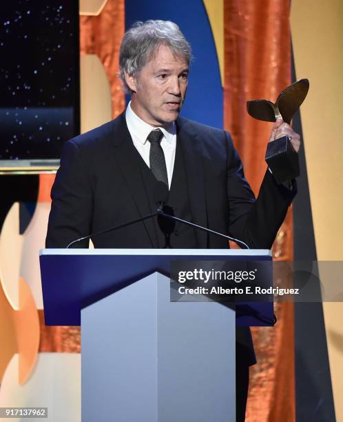 Writer-producer David E. Kelley accepts the Long Form Adapted award for 'Big Little Lies' onstage during the 2018 Writers Guild Awards L.A. Ceremony...