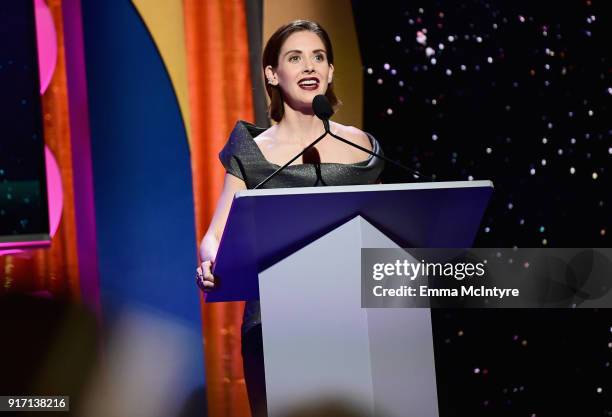 Alison Brie speaks onstage during the 2018 Writers Guild Awards L.A. Ceremony at The Beverly Hilton Hotel on February 11, 2018 in Beverly Hills,...