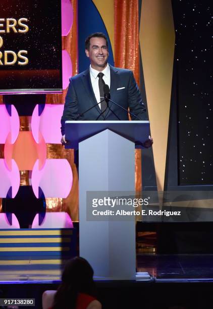 Comedian Rob Riggle speaks onstage during the 2018 Writers Guild Awards L.A. Ceremony at The Beverly Hilton Hotel on February 11, 2018 in Beverly...