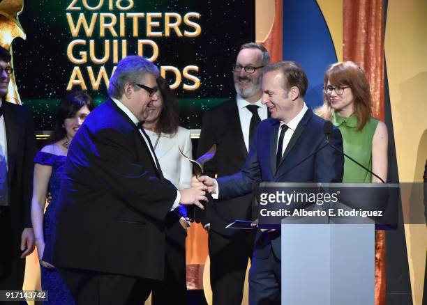Writer-producer David Mandel and the writers of 'Veep' accept the Comedy Series award from actor Bob Odenkirk onstage during the 2018 Writers Guild...