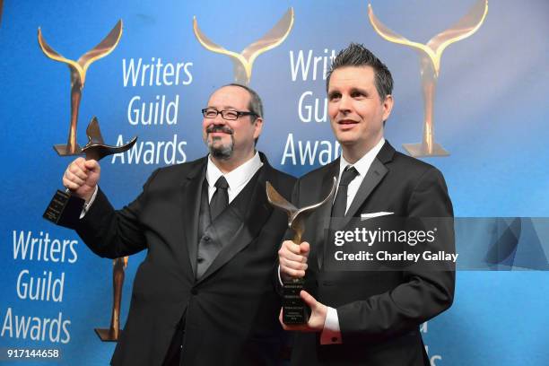 John Gonzalez and Benjamin McCaw pose with the 'Outstanding Achievement In Videogame Writing' award for 'Horizon Zero Dawn' during the 2018 Writers...