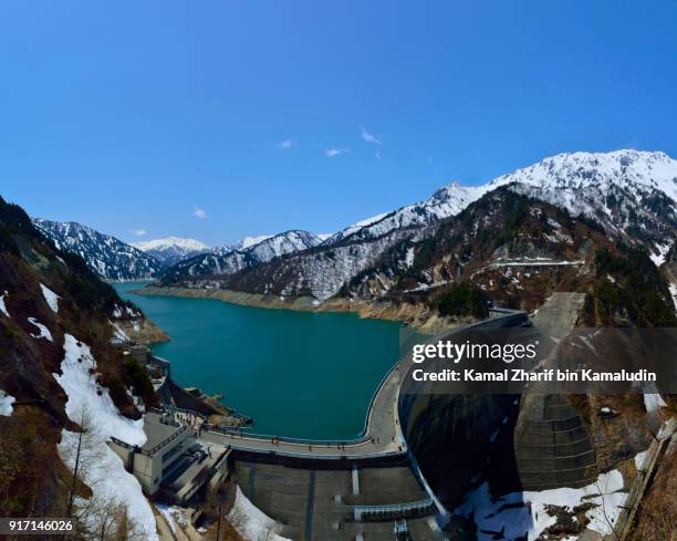 kurobe dam at tateyama kurobe alpine route - chilly bin stock pictures, royalty-free photos & images