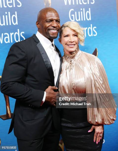 Terry Crews and Rebecca Crews arrive to the 2018 Writers Guild Awards L.A. Ceremony held at The Beverly Hilton Hotel on February 11, 2018 in Beverly...