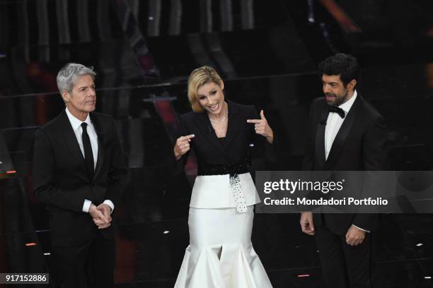 Tv hosts Claudio Baglioni, Michelle Hunziker and Pierfrancesco Favino on the Ariston stage during the 68th Festival di Sanremo. Sanremo, February 8th...