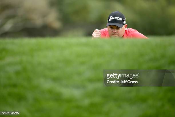Ted Potter Jr. Lines up a putt on the 12th green during the Final Round of the AT&T Pebble Beach Pro-Am at Pebble Beach Golf Links on February 11,...