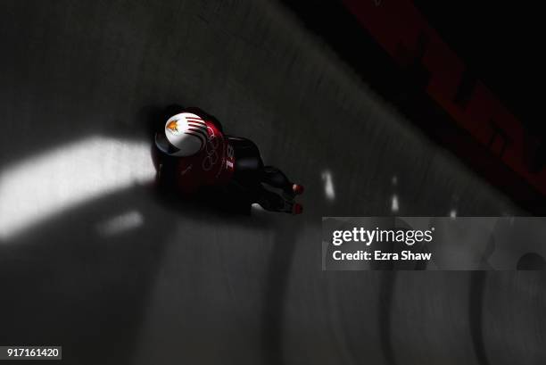 Katie Uhlaender of the United States slides down the track during women skeleton training at Olympic Sliding Centre on February 12, 2018 in...