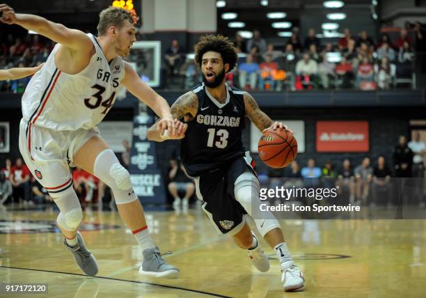 Gonzaga Bulldogs guard Josh Perkins tries to fake out St. Mary's Gaels center Jock Landale during the regular season game between the St. Mary's...