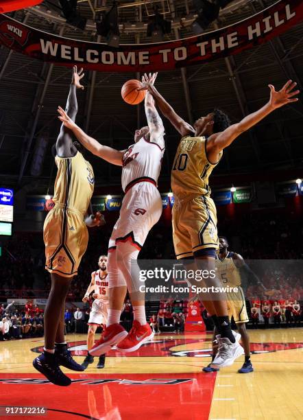 Florida International Golden Panthers forward Hassan Hussein blocks the shot of Western Kentucky Hilltoppers forward Justin Johnson during the second...