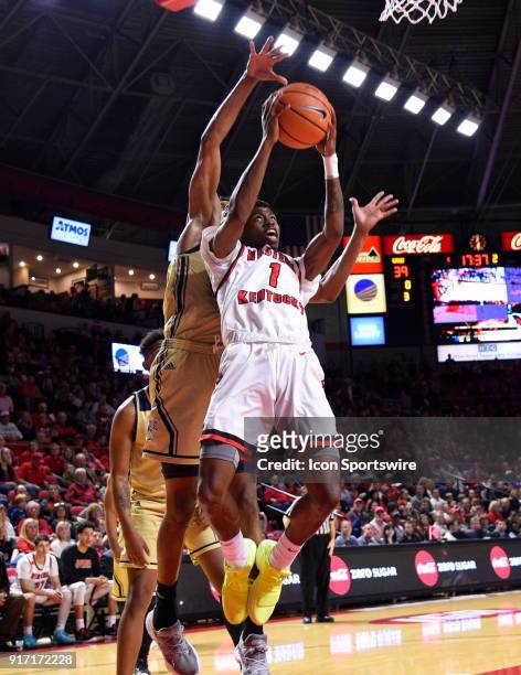 Western Kentucky Hilltoppers guard Lamonte Bearden gets fouled from behind by Florida International Golden Panthers guard Brian Beard Jr. During the...