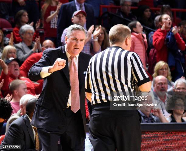 Western Kentucky Hilltoppers head coach Rick Stansberry talks with the referee during the second half between the Florida International Golden...