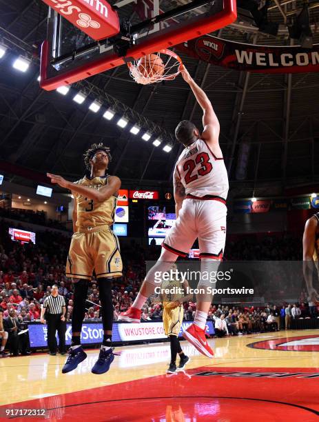 Western Kentucky Hilltoppers forward Justin Johnson finishes the game off with a big slam during the second half between the Florida International...