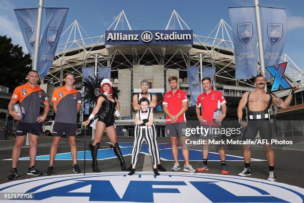 Dane Rampe and Jake Lloyd of the Sydney Swans and Tom Scully and Lachie Whitfield of GWS Giants pose with performers during the Sydney AFLX launch at...