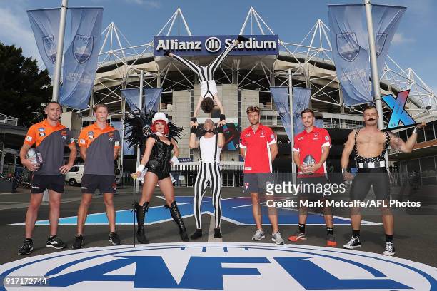 Dane Rampe and Jake Lloyd of the Sydney Swans and Tom Scully and Lachie Whitfield of GWS Giants pose with performers during the Sydney AFLX launch at...