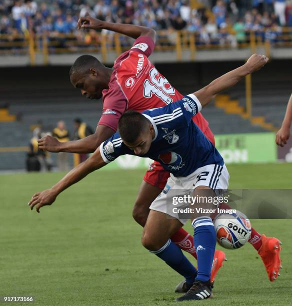 Jhon Duque Arias of Millonarios fights for the ball with Miller Mosquera of Patriotas Boyaca during a match between Millonarios and Patriotas Boyaca...