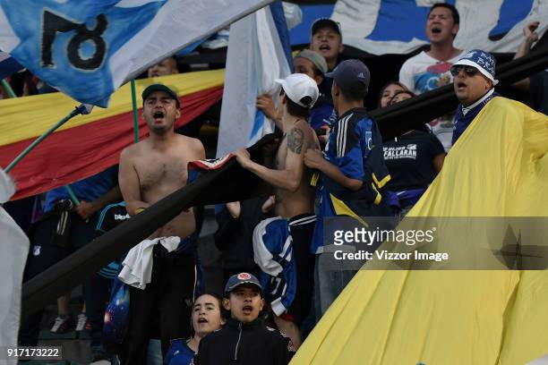 Fans of Millonarios cheer for their team during a match between Millonarios and Patriotas Boyaca as part of Liga Aguila I 2018 at Nemesio Camacho...