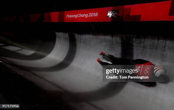 Katie Uhlaender of the United States slides down the track during Women Skeleton training at Olympic Sliding Centre on February 12, 2018 in...