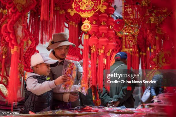 Citizens buy goods for Tibetan New Year on February 11, 2018 in Lhasa, Tibet Autonomous Region of China. According to this year's Tibetan calendar,...