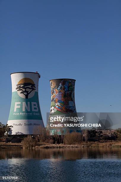 General view of the thermal power planted, closed 11 years ago, in Soweto on June 28, 2009. The cooling tower is about 100m high and painted with...