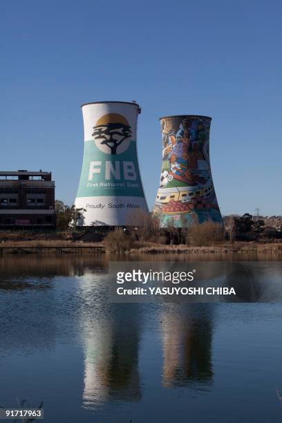 General view of the thermal power planted, closed 11 years ago, in Soweto on June 28, 2009. The cooling tower is about 100m high and painted with...
