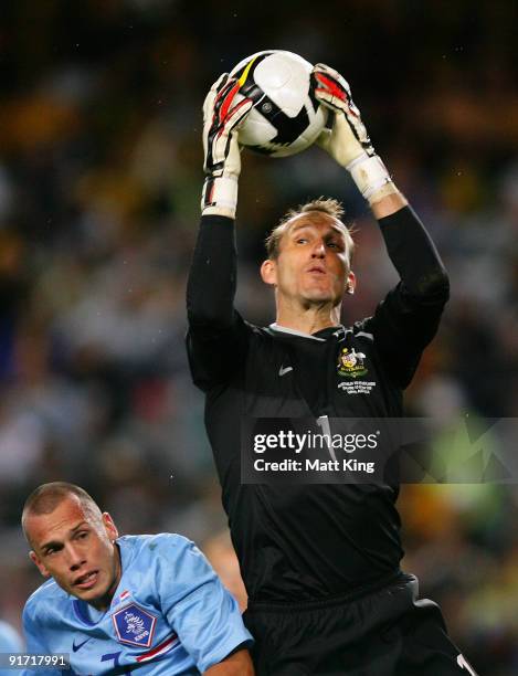 Mark Schwarzer of the Socceroos saves a shot on goal during the International friendly football match between Australia and the Netherlands at Sydney...