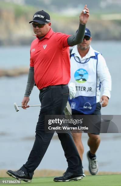 Ted Potter Jr of the USA acknowledges the crowd on the 18th green during the final round of the AT&T Pebble Beach Pro-Am the Pebble Beach Golf Links...