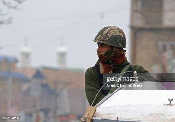 An Indian paramilitary soldier is seen in old city Srinagar the summer capital of Indian controlled Kashmir on February 11, 2018.Government...
