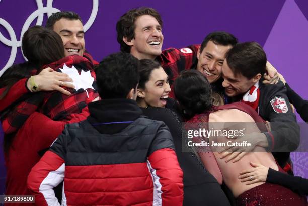 Team Canada celebrates winning the gold medal in the Figure Skating Team Event on day three of the PyeongChang 2018 Winter Olympic Games at Gangneung...