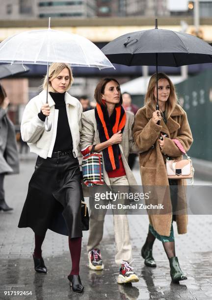 Linda Tol, Loulou De Saison and Charlotte Groeneveld are seen outside the Tibi show during New York Fashion Week: Women's A/W 2018 on February 11,...
