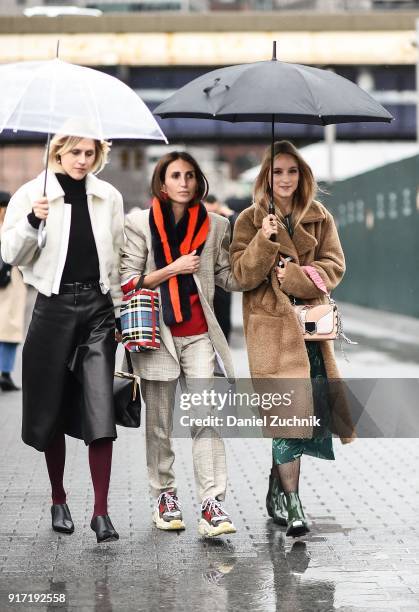 Linda Tol, Loulou De Saison and Charlotte Groeneveld are seen outside the Tibi show during New York Fashion Week: Women's A/W 2018 on February 11,...