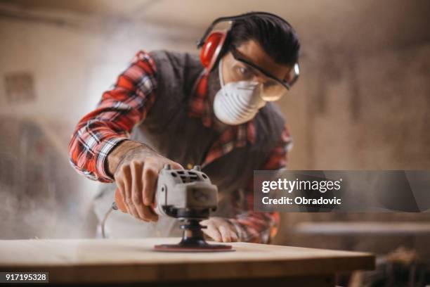 sander in action - woodwork stock pictures, royalty-free photos & images