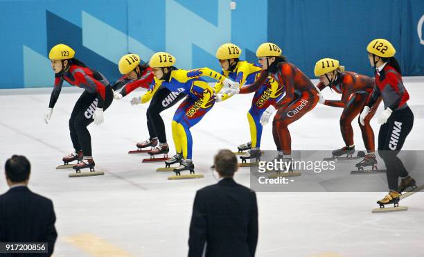 Chinese Yang Yang is pushed by her compatriot Chunlu Wang, Min-Jin Joo of South Korea is pushed by her compatriot Hye-Won Park, Canadian Isabelle...
