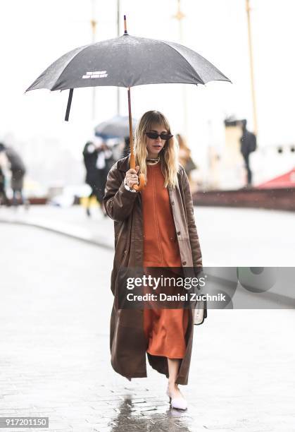 Courtney Trop is seen wearing a brown leather coat outside the Tibi show during New York Fashion Week: Women's A/W 2018 on February 11, 2018 in New...