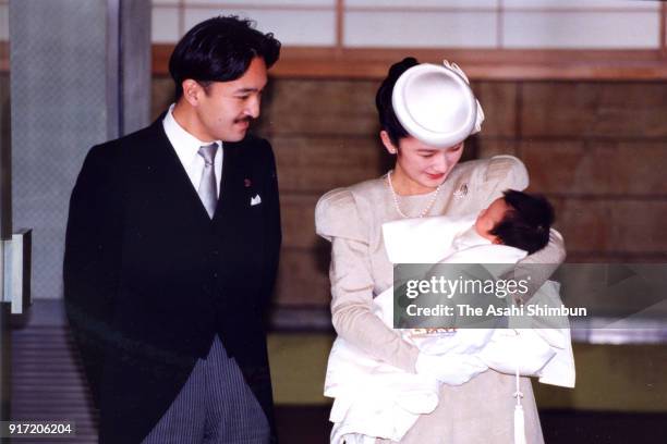 Prince Akishino and Princess Kiko holding her daughter Princess Mako are seen after their meeting with Emperor Akihito and Empress Michiko following...