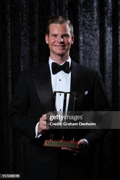 Steve Smith poses with the award for Test Player of the Year during the 2018 Allan Border Medal at Crown Palladium on February 12, 2018 in Melbourne,...