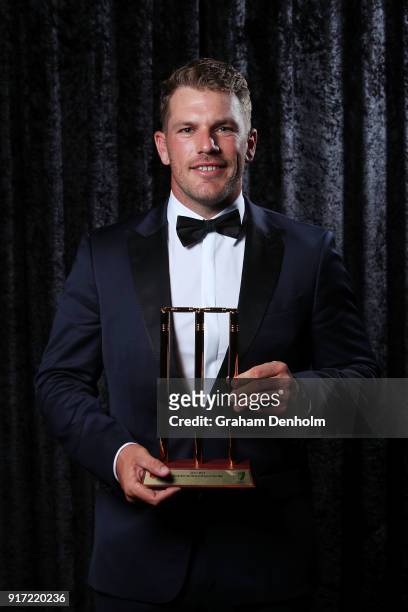 Aaron Finch poses with the award for T20 Player of the Year during the 2018 Allan Border Medal at Crown Palladium on February 12, 2018 in Melbourne,...