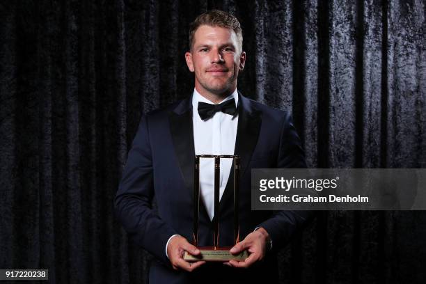 Aaron Finch poses with the award for T20 Player of the Year during the 2018 Allan Border Medal at Crown Palladium on February 12, 2018 in Melbourne,...