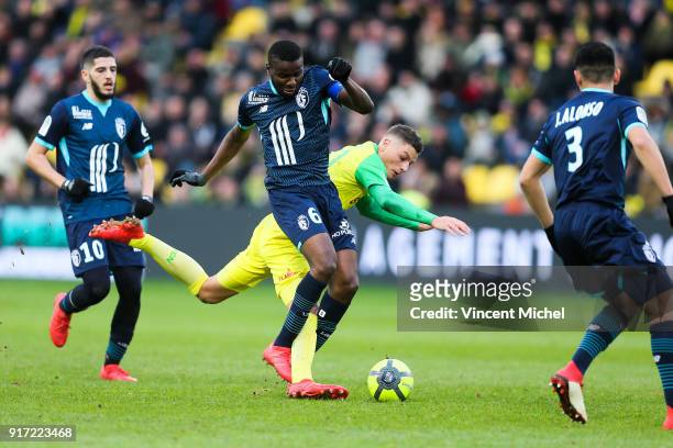 Ibrahim Amadou of Lille and Andrei Girotto of Nantes during the Ligue 1 match between Nantes and Lille OSC at Stade de la Beaujoire on February 11,...