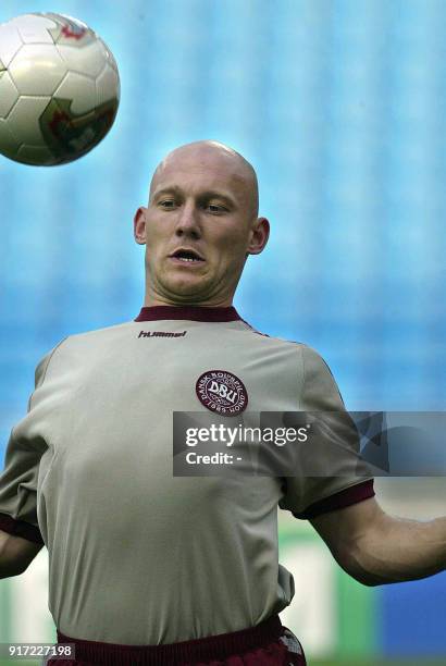 Thomas Gravesen of Denmark chests the ball during a traininig session at the Ulsan Munsu football stadium, 31 May 2002 in Ulsan, where Denmark open...