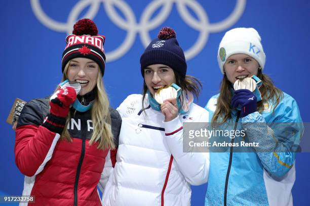 Silver medalist Justine Dufour-Lapointe of Canada, gold medalist Perrine Laffont of France and bronze medalist Yulia Galysheva of Kazakhstan pose...