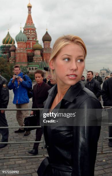 Russian tennis star Anna Kournikova walks along Red square after the exhibition tennis match with Moscow's Mayor Yuri Luzhkov in the capital 02...