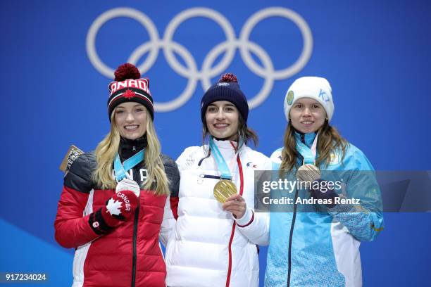 Silver medalist Justine Dufour-Lapointe of Canada, gold medalist Perrine Laffont of France and bronze medalist Yulia Galysheva of Kazakhstan pose...