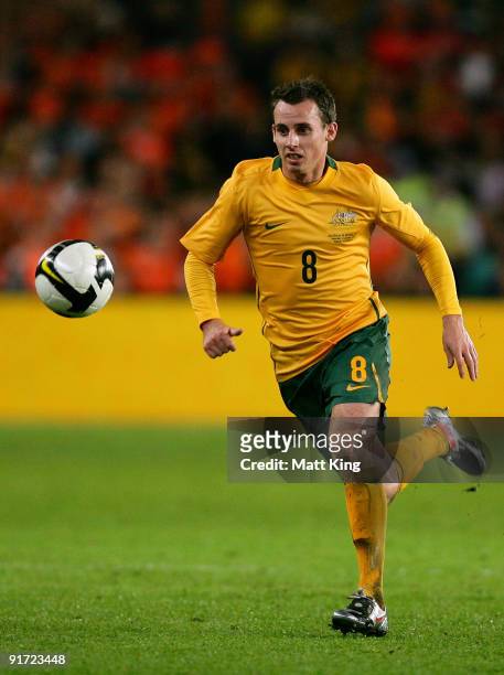 Luke Wilkshire of the Socceroos controls the ball during the International friendly football match between Australia and the Netherlands at Sydney...