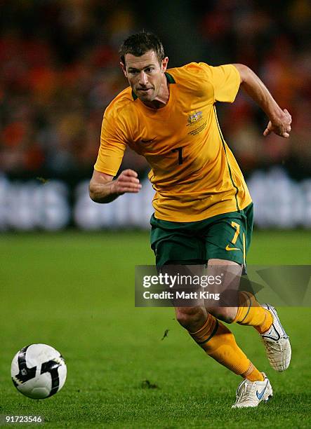 Brett Emerton of the Socceroos controls the ball during the International friendly football match between Australia and the Netherlands at Sydney...